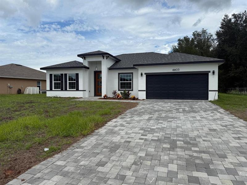 Front exterior of a new home in , Ocala, FL, highlighting curb appeal (Image 7). Front exterior of a new home in , Ocala, FL, highlighting curb appeal (Image 7).