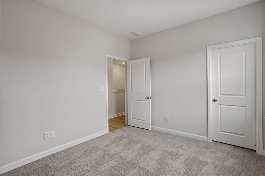 Spacious, unfurnished interior of a new home in Sweetbrier, Durham (Image 25).