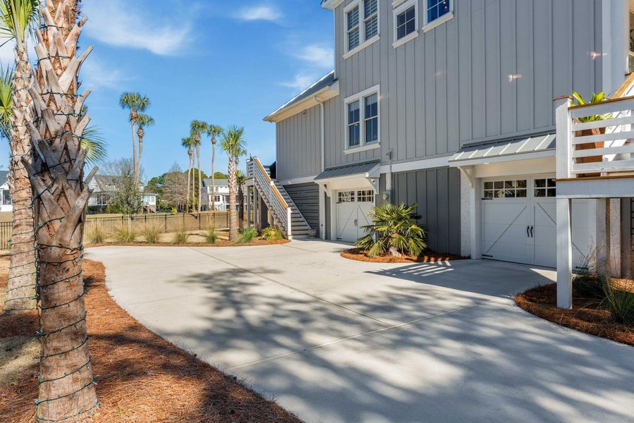 Exterior details and patio area of a home in , Johns Island (Image 31).