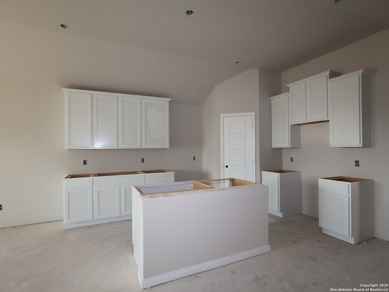In-progress construction of a new home in Hunters Ranch, San Antonio, TX (Image 34).