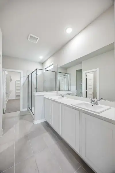 Primary Bathroom in the Willow home plan by Trophy Signature Homes – REPRESENTATIVE PHOTO Primary Bathroom in the Willow home plan by Trophy Signature Homes – REPRESENTATIVE PHOTO