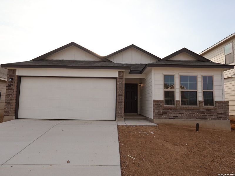 Front exterior of a new home in Agave, San Antonio, TX, highlighting curb appeal (Image 19).
