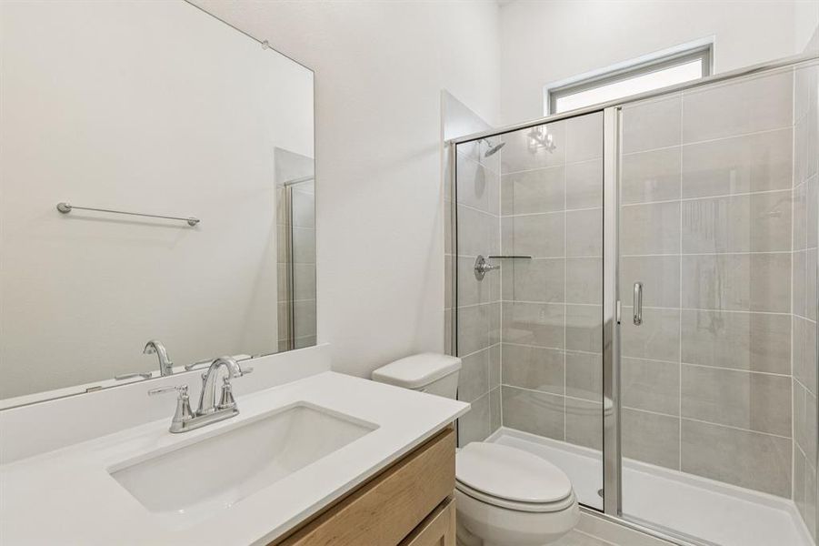 Bathroom in the Da Vinci II home plan by Trophy Signature Homes – REPRESENTATIVE PHOTO