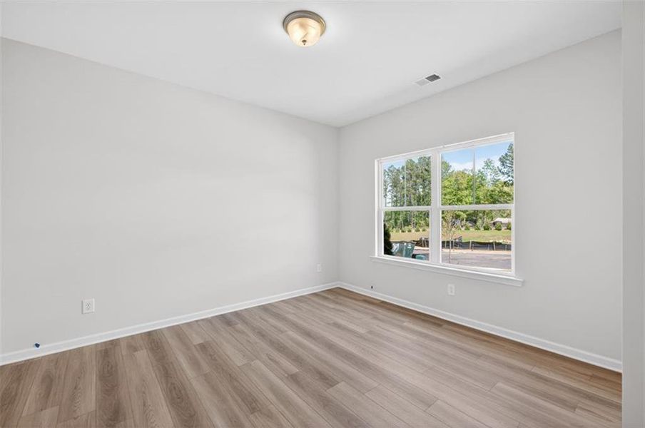 Spacious, unfurnished interior of a new home in Summerfield Place, Carrollton (Image 8).