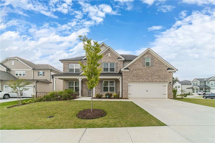 Front exterior of a new home in , Grayson, GA, highlighting curb appeal (Image 27). Front exterior of a new home in , Grayson, GA, highlighting curb appeal (Image 27).