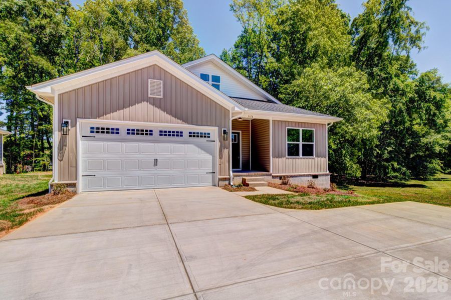 Front exterior of a new home in , Cherryville, NC, highlighting curb appeal (Image 18).