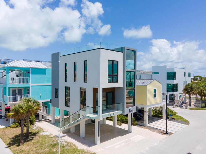 Front exterior of a new home in , Key Largo, FL, highlighting curb appeal (Image 27).