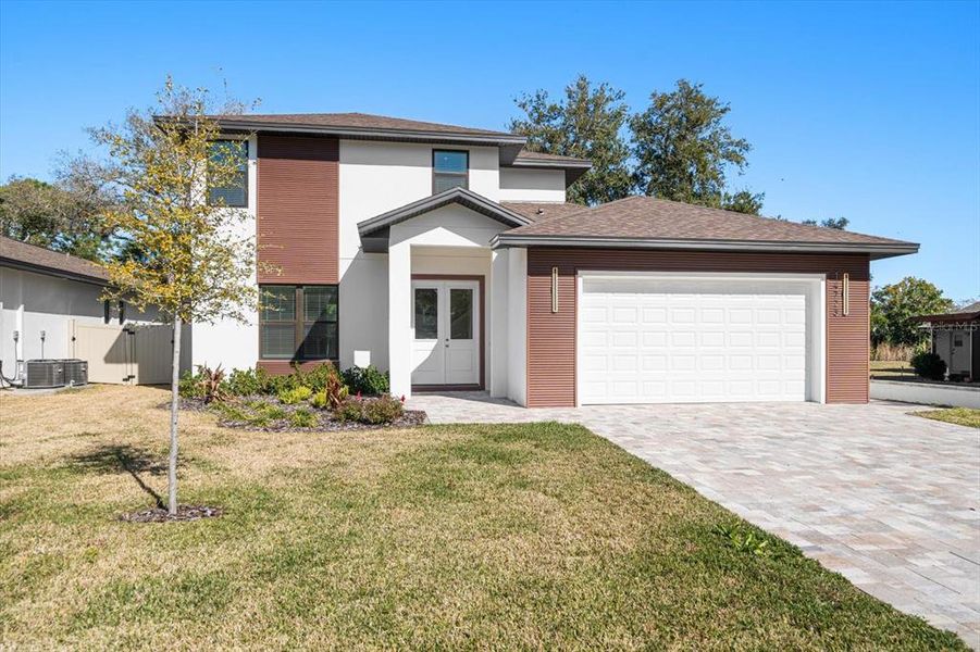 Front exterior of a new home in , Largo, FL, highlighting curb appeal (Image 26).