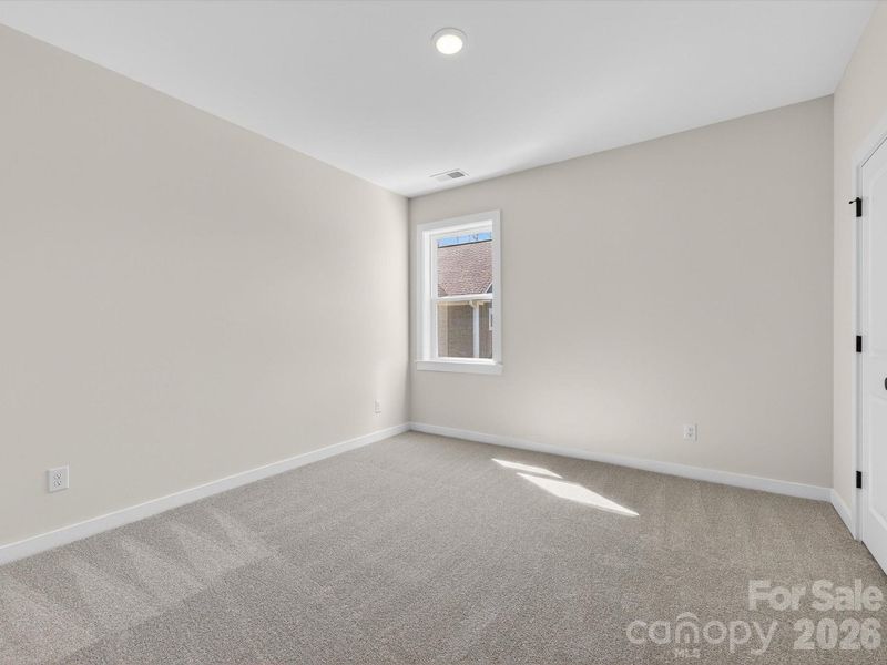 Spacious, unfurnished interior of a new home in North Creek Village, Huntersville (Image 30).