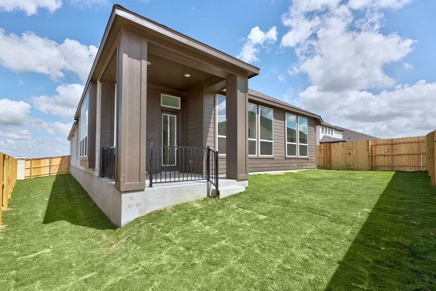 Exterior details and patio area of a home in Lariat, Liberty Hill (Image 3).