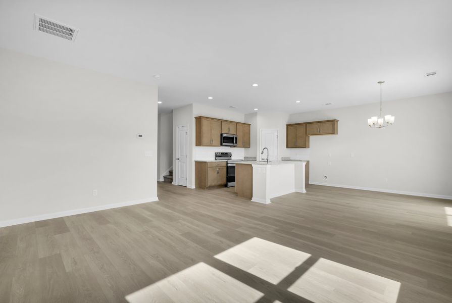 Representative unfurnished interior of a home built from the The Magnolia by Smith Family Homes in Lakeview Pines, Statesboro (Image 39).