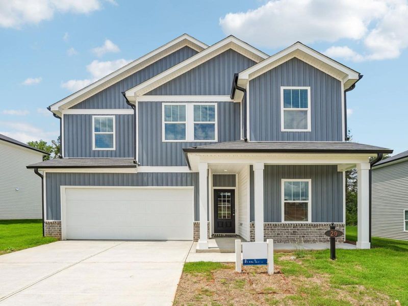 Front exterior of a new home in Preserve at Mountain Creek, Pendergrass, GA, highlighting curb appeal (Image 1). Front exterior of a new home in Preserve at Mountain Creek, Pendergrass, GA, highlighting curb appeal (Image 1).