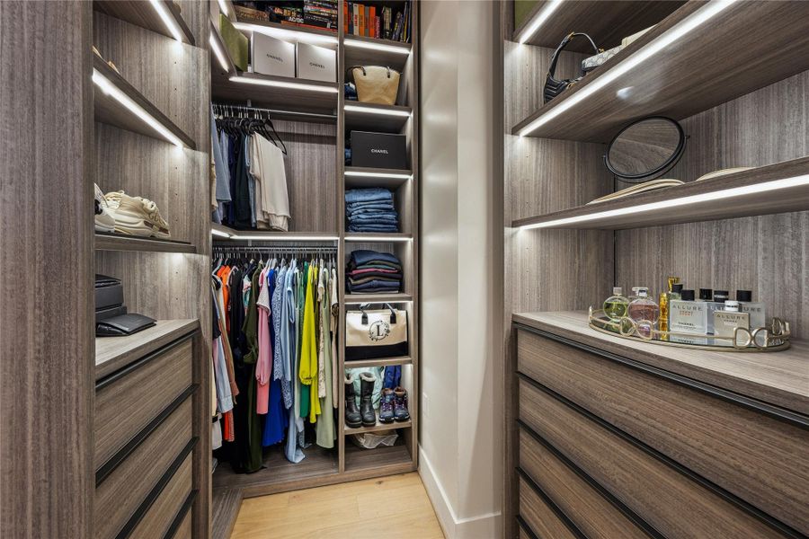 Custom primary closet by B-Design.