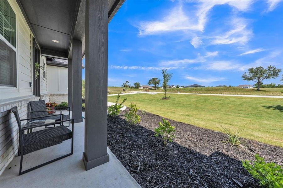 Covered front porch with recessed lighting