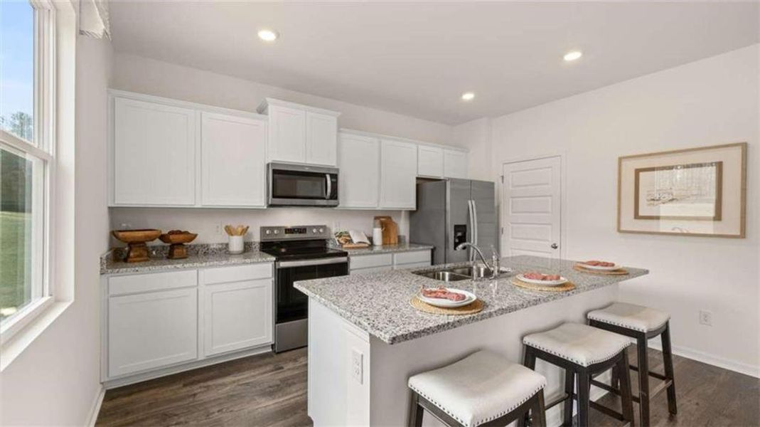 Furnished interior view inside a new home in Oakchase at Hampton, Hampton (Image 11).