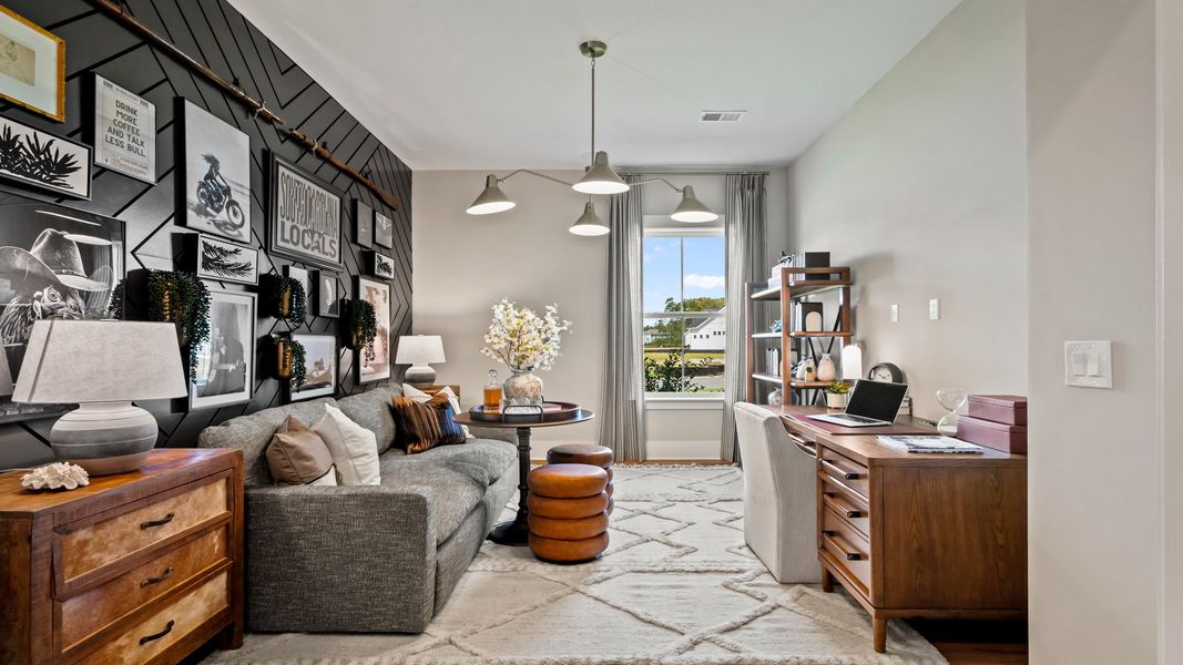 Representative furnished interior of a home built from the Traveler by DRB Elevate. in Summerwind Crossing at Lakes of Cane Bay, Summerville (Image 7).