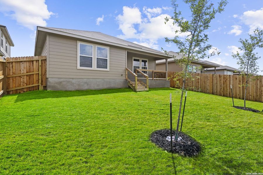 Exterior details and patio area of a home in Brookstone Creek, San Antonio (Image 18).