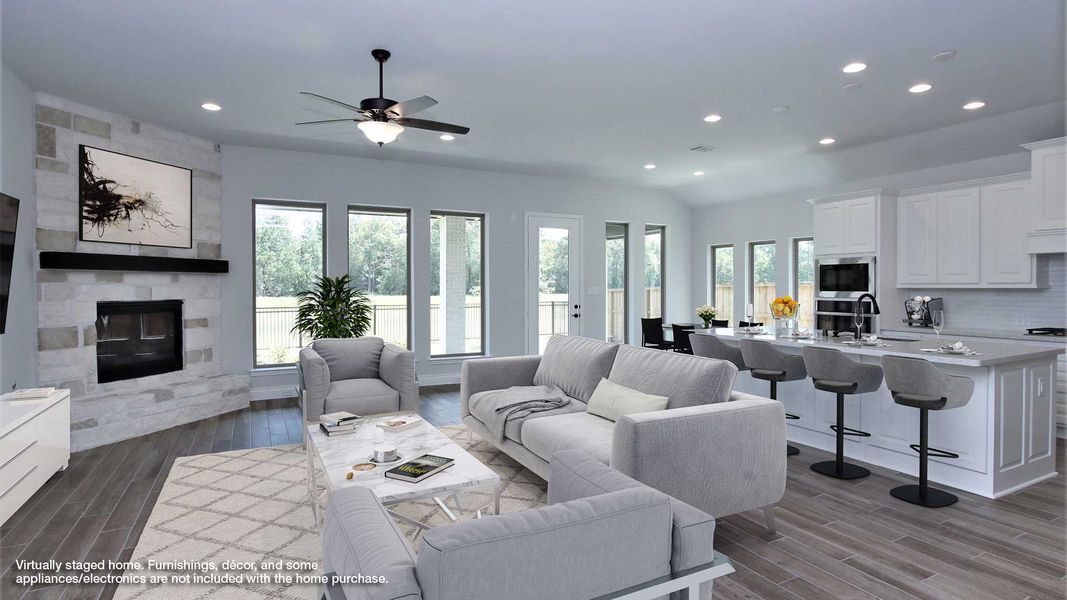 Representative furnished interior of a home built from the 2935M by Perry Homes in Lakes of Cane Island, Katy (Image 5).