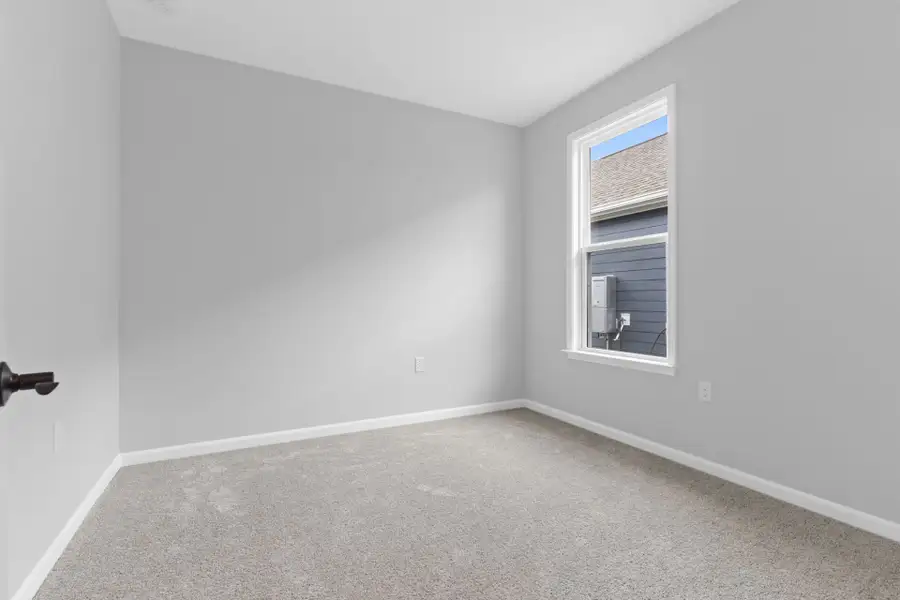Representative unfurnished interior of a home built from the Alpine by Del Webb in Del Webb Ocean Isle Beach, Shallotte (Image 19).