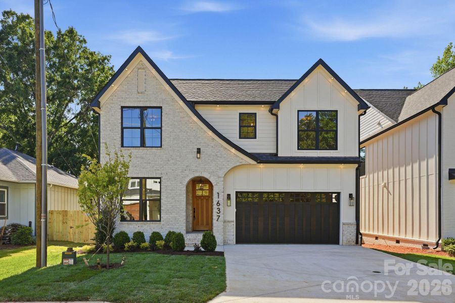 Front exterior of a new home in , Charlotte, NC, highlighting curb appeal (Image 27). Front exterior of a new home in , Charlotte, NC, highlighting curb appeal (Image 27).