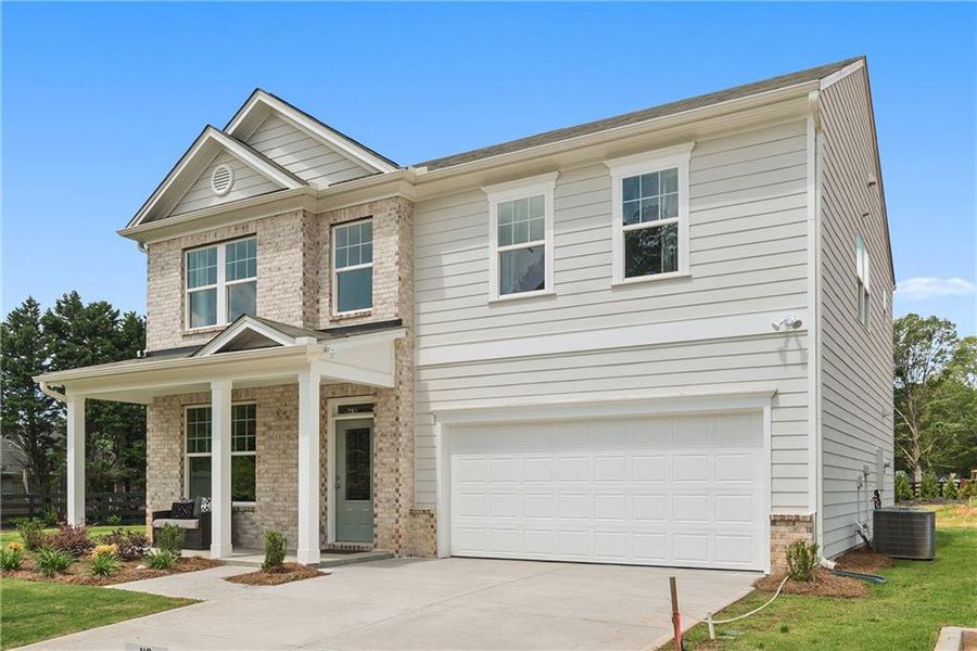 Front exterior of a new home in Hickory Heights, Acworth, GA, highlighting curb appeal (Image 23).