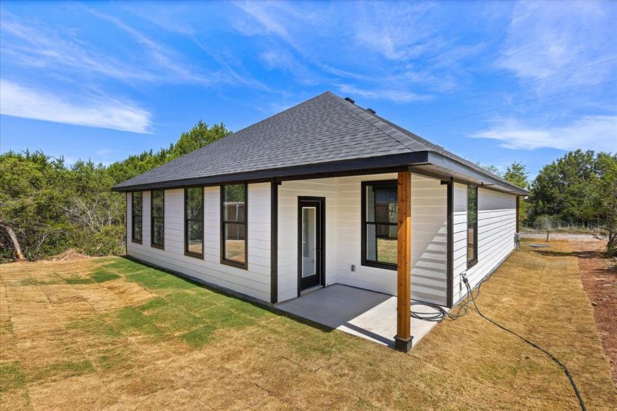 Front exterior of a new home in , Granbury, TX, highlighting curb appeal (Image 2). Front exterior of a new home in , Granbury, TX, highlighting curb appeal (Image 2).
