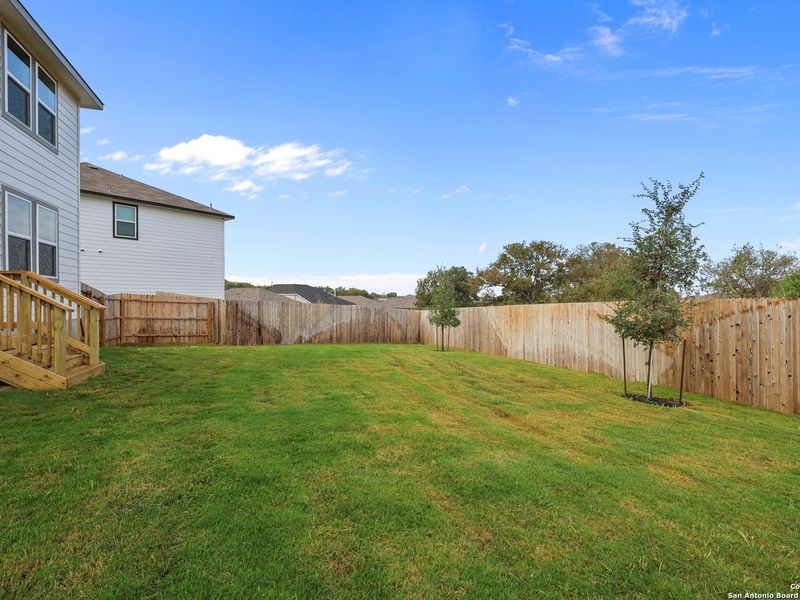 Exterior details and patio area of a home in Royal Crest, San Antonio (Image 18).