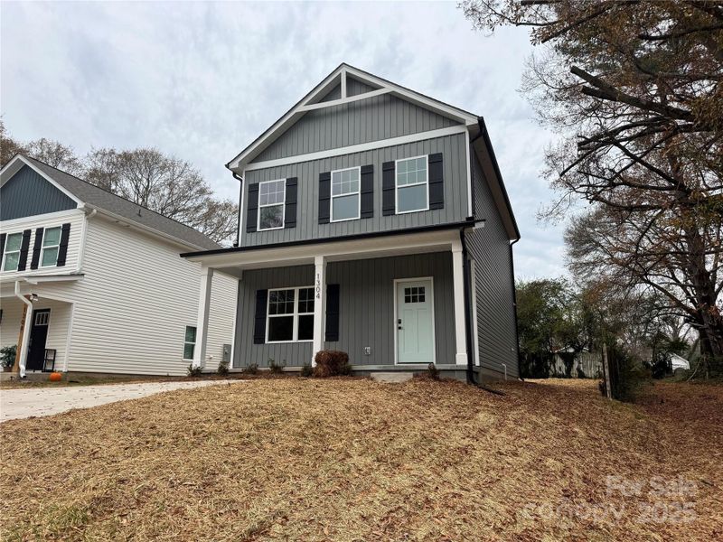 Front exterior of a new home in , Gastonia, NC, highlighting curb appeal (Image 1). Front exterior of a new home in , Gastonia, NC, highlighting curb appeal (Image 1).