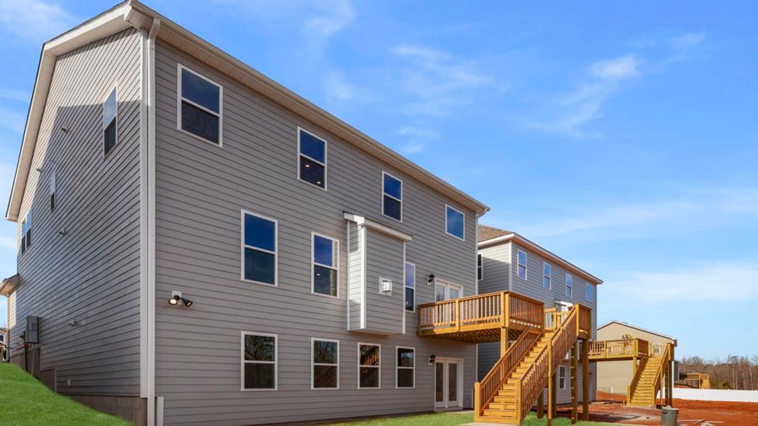 Exterior details and patio area of a home in Whitehawk Meadows, Travelers Rest (Image 4).