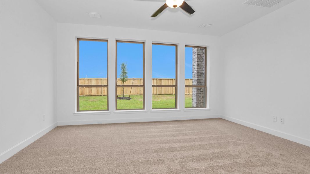 Spacious, unfurnished interior of a new home in Legacy Prairie at Katy Court, Katy (Image 8).