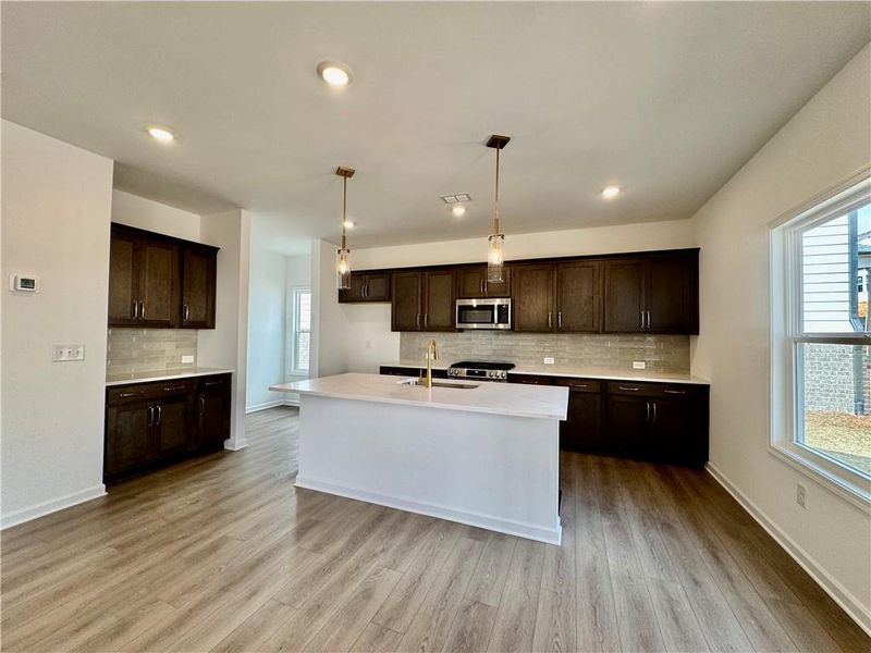 Furnished interior view inside a new home in Eastlyn Crossing, Flowery Branch (Image 8).