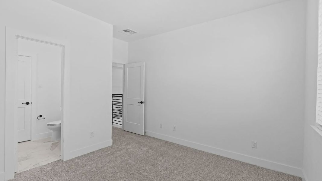 Spacious, unfurnished interior of a new home in Attwater 55s, Waller (Image 28).