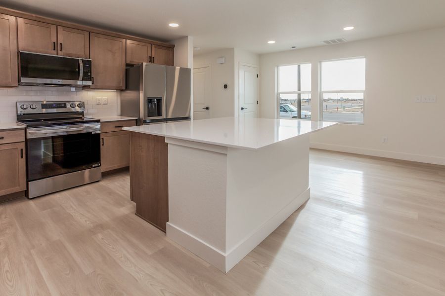 Furnished interior view inside a new home in Prairie Song Cottages, Windsor (Image 10).