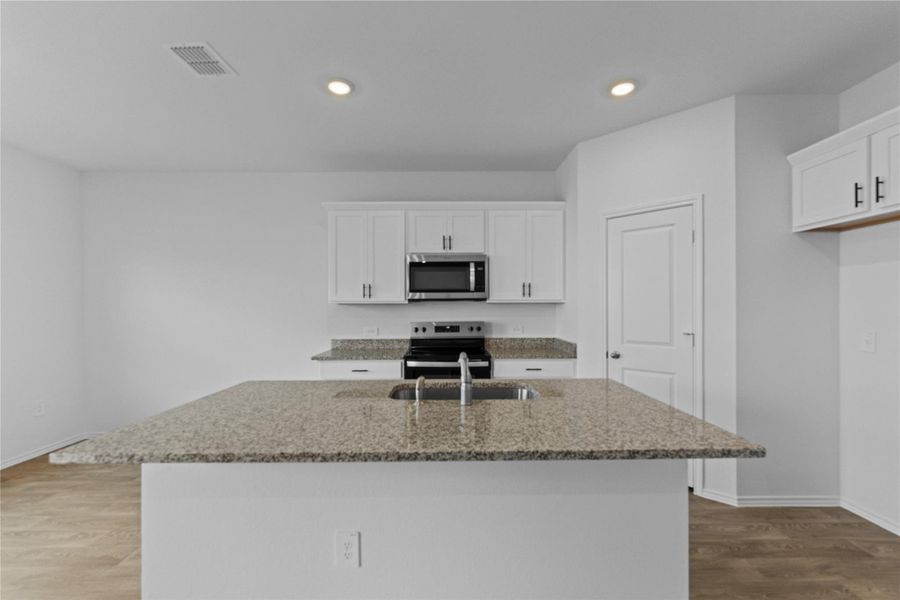 Furnished interior view inside a new home in Palomino, Manor (Image 8).