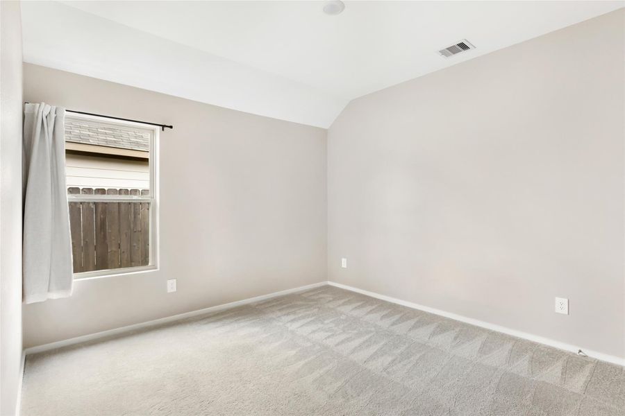 Spacious, unfurnished interior of a new home in Pinewood at Grand Texas, New Caney (Image 23).