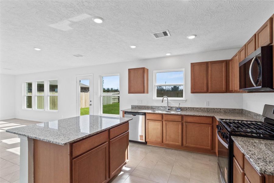Furnished interior view inside a new home in Vida Costera, Texas City (Image 13).