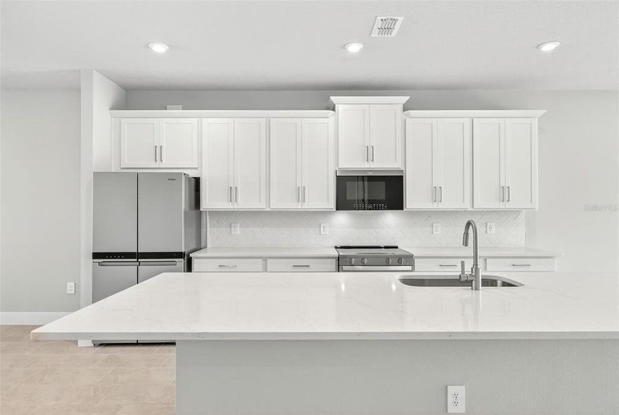 Furnished interior view inside a new home in Wellen Park, Venice (Image 4).