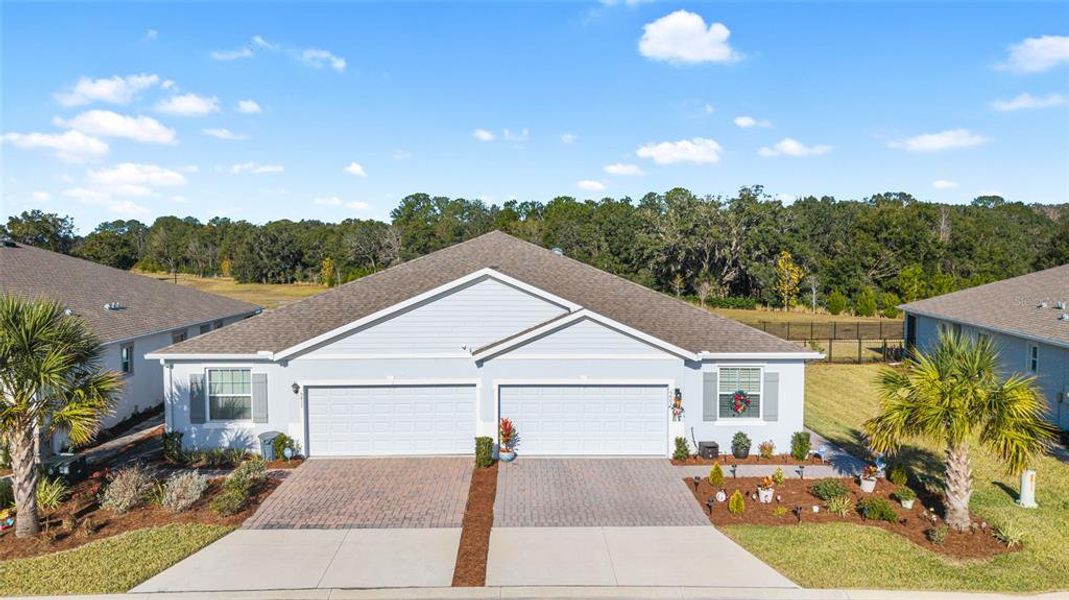 Front exterior of a new home in , Ocala, FL, highlighting curb appeal (Image 26).