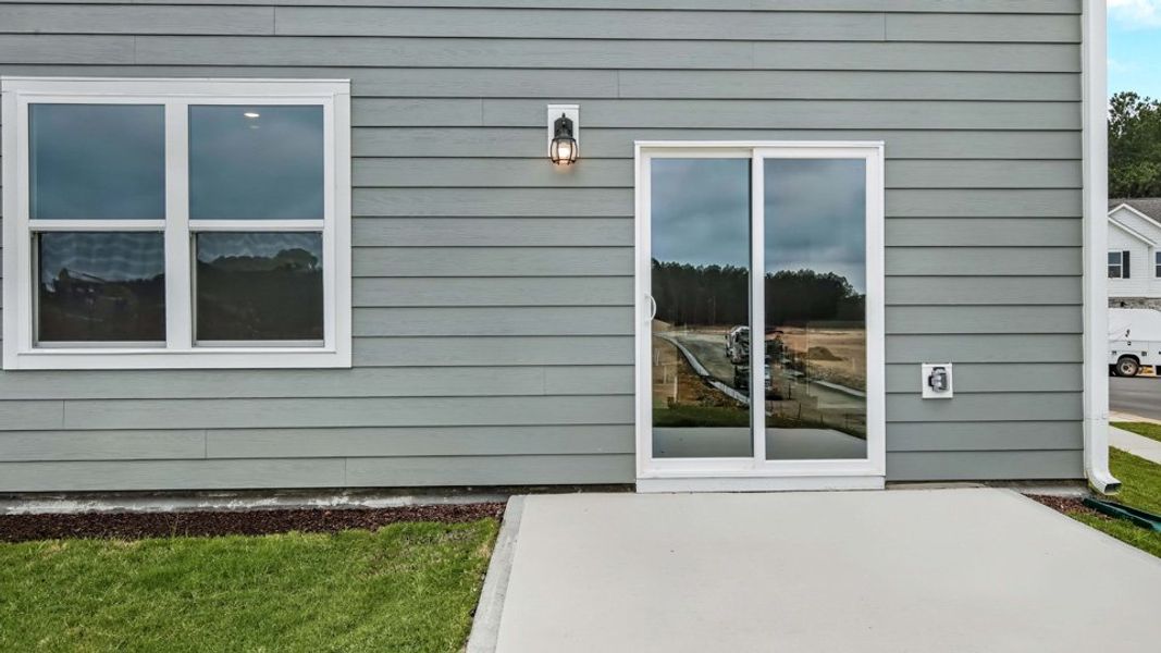 Exterior details and patio area of a home in Bexford, Willow Spring (Image 3).