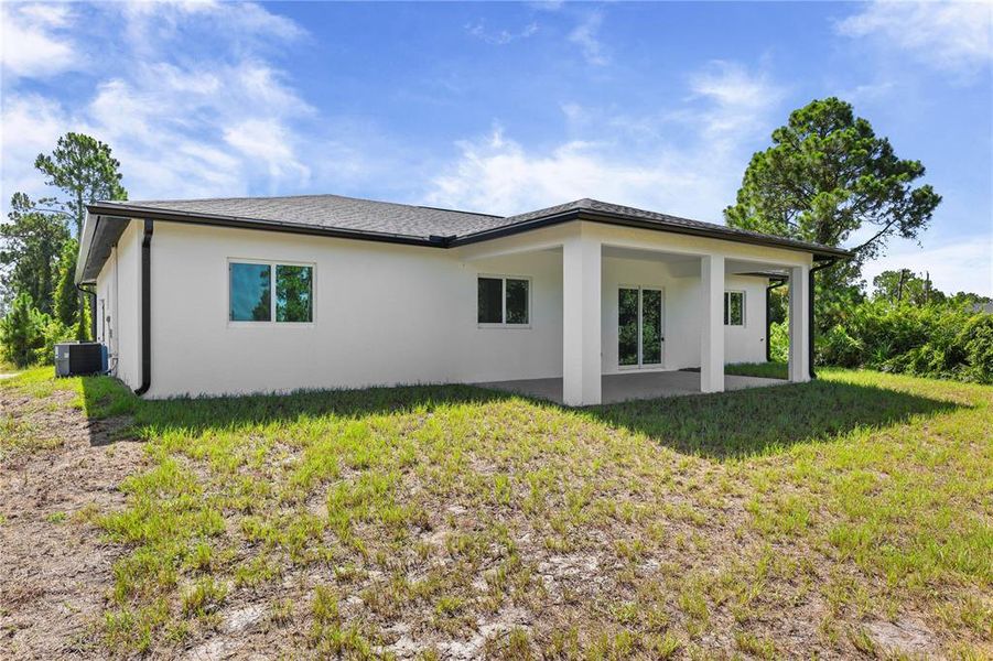Exterior details and patio area of a home in , Lehigh Acres (Image 18). Exterior details and patio area of a home in , Lehigh Acres (Image 18).