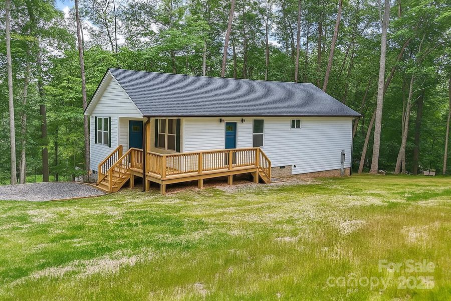 Front exterior of a new home in , Candler, NC, highlighting curb appeal (Image 25).