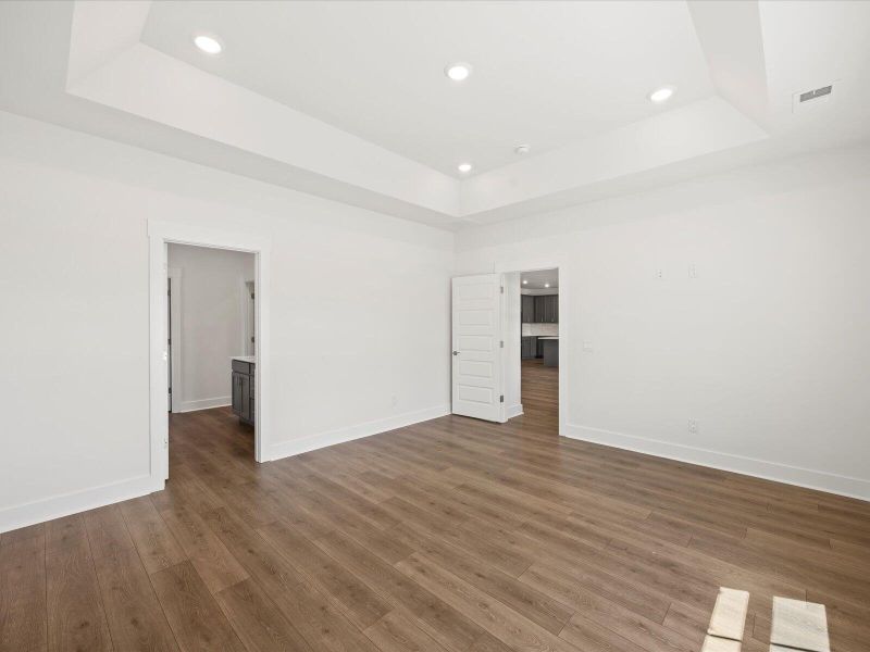 Spacious, unfurnished interior of a new home in The Coves at Lakes of Cane Bay II, Summerville (Image 28). Spacious, unfurnished interior of a new home in The Coves at Lakes of Cane Bay II, Summerville (Image 28).