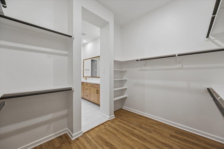 Expansive Walk-In Primary Closet
