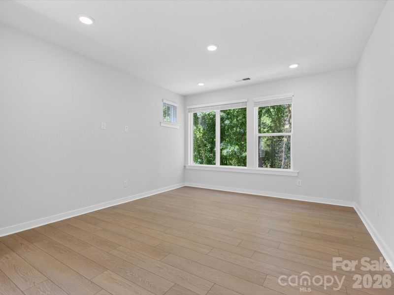Spacious, unfurnished interior of a new home in Central Living at Craig, Charlotte (Image 15).