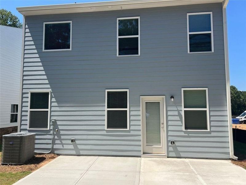 Exterior details and patio area of a home in Castleberry Pointe, Dawsonville (Image 3).