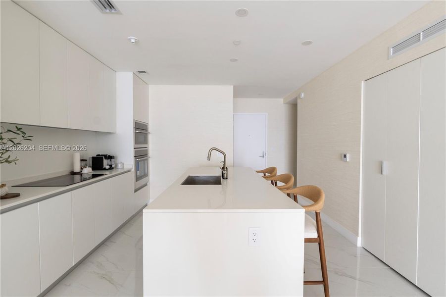Furnished interior view inside a new home in Aria Reserve, Miami (Image 6).