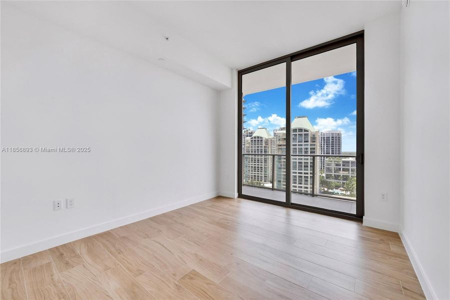 Spacious, unfurnished interior of a new home in Mr. C Residences, Miami (Image 14).