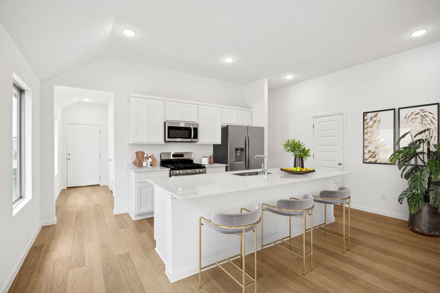 Kitchen in the Spruce home plan by Trophy Signature Homes - REPRESENTATIVE PHOTO