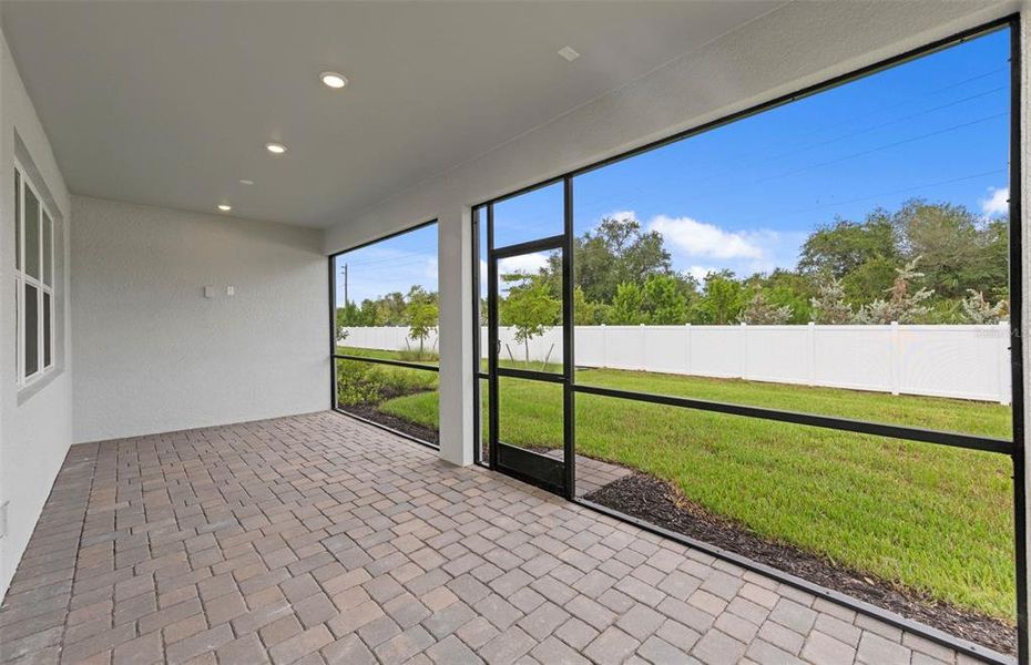 Exterior details and patio area of a home in Shores at Stillwater, Englewood (Image 3).