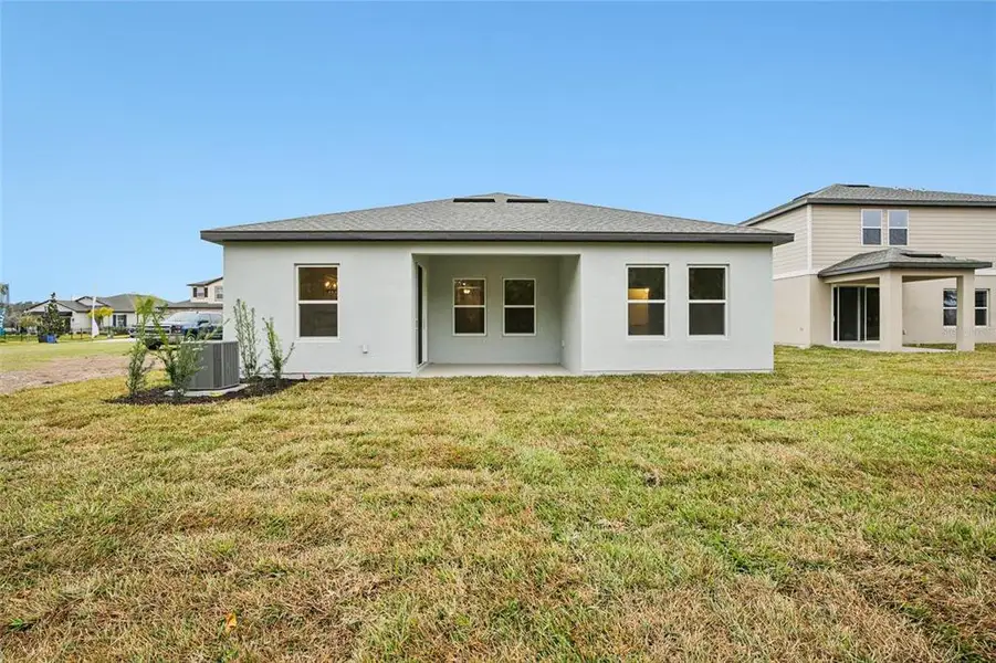 Exterior details and patio area of a home in Berry Bay, Wimauma (Image 3). Exterior details and patio area of a home in Berry Bay, Wimauma (Image 3).
